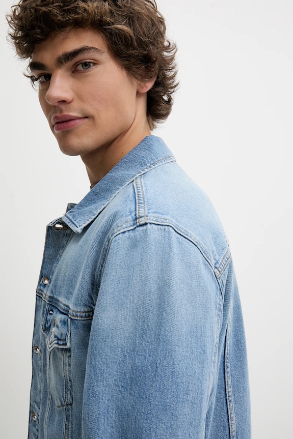 Džínová bunda Tommy Jeans modrá DM0DM21916
