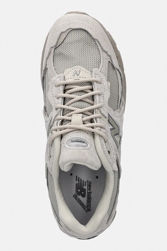 Маратонки New Balance U2002DX Protection Pack бежов U2002DXC