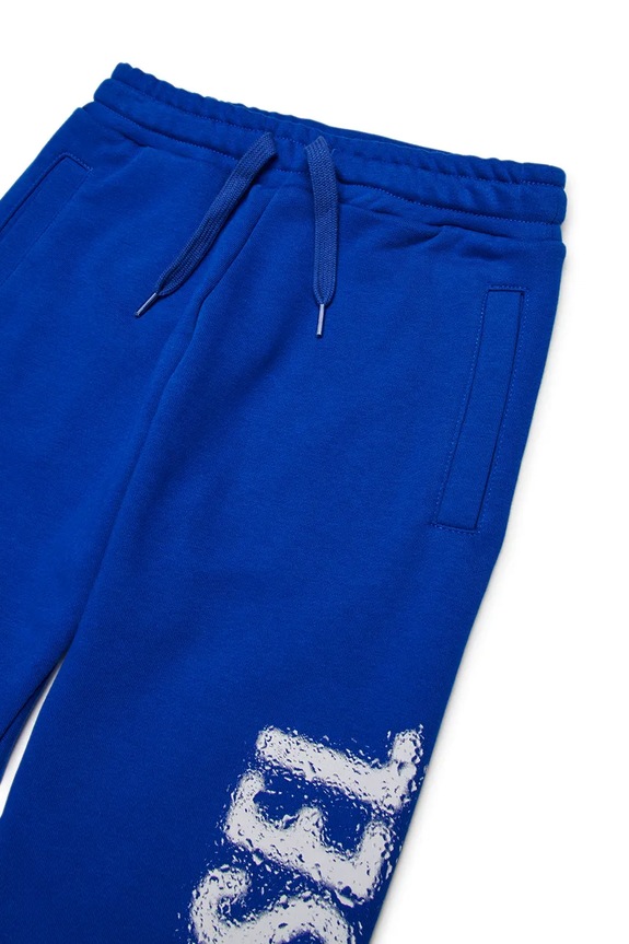 CHLAPEC Dětské bavlněné tepláky Diesel PANTLI TROUSERS J02445 modrá