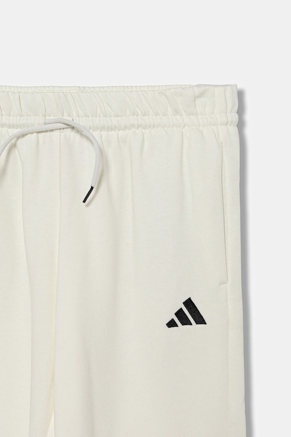 adidas spodnie dresowe dziecięce beżowy KC1178