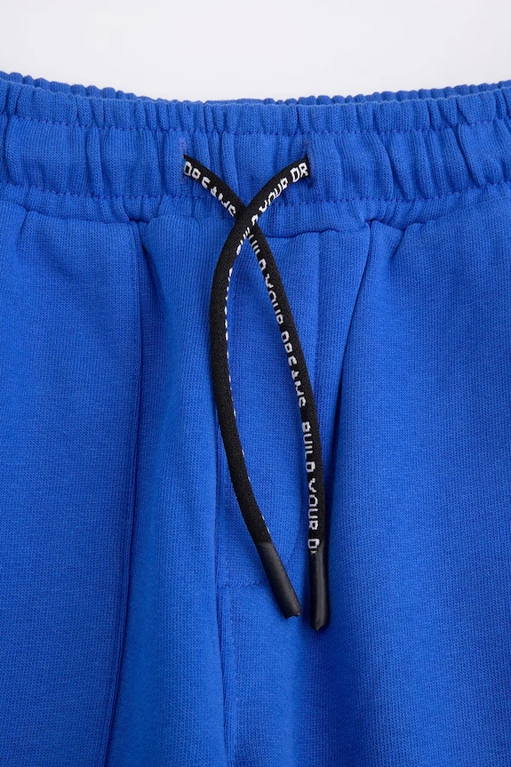 Băieți Coccodrillo pantaloni de trening din bumbac pentru copii CITY BUILDER BOY KIDS ZC5120201CBK albastru