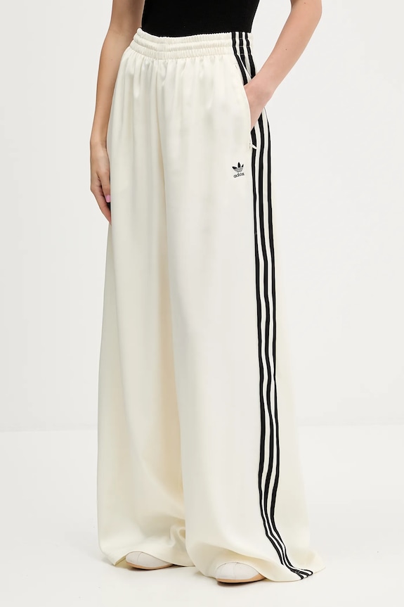Tepláky adidas Originals Satin Tp Wl s elastanom béžová KD2542