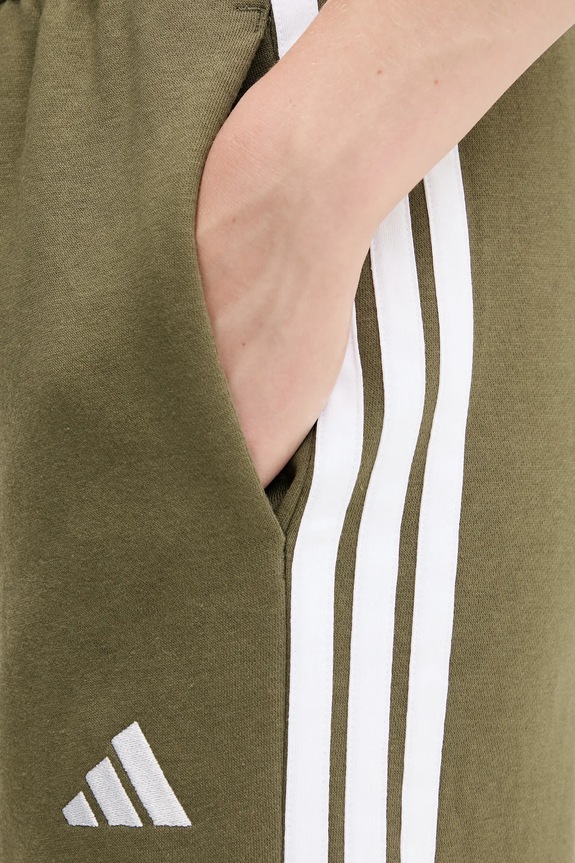Tepláky adidas zelená JX7708