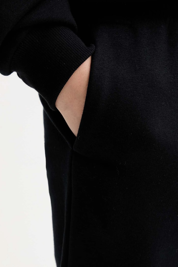 MUUV. pantaloni de trening MUUV. x Answear negru DRESOWE.NISKI.STAN.RAIZ