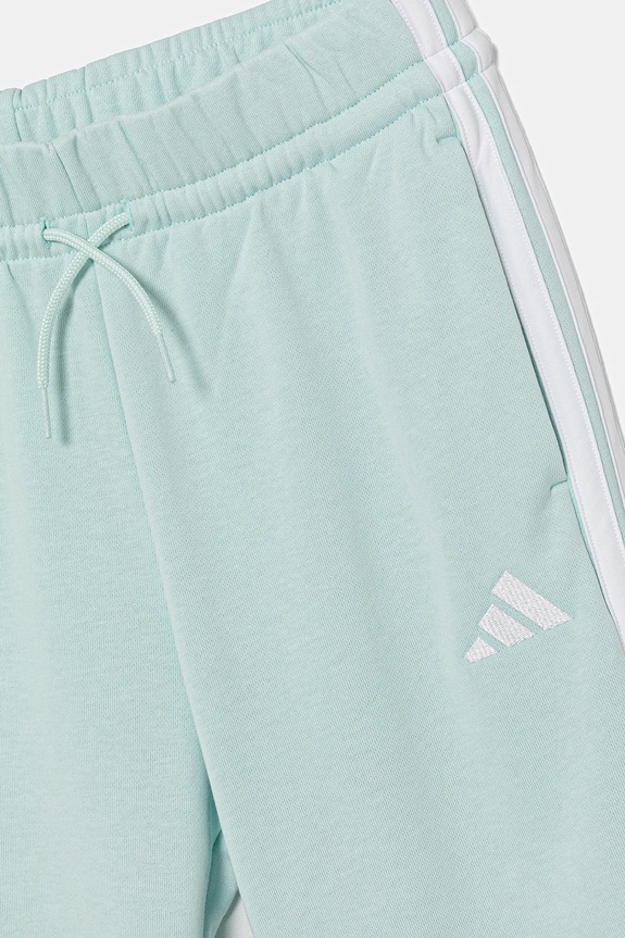 Otroški spodnji del trenirke adidas turkizna KB7304