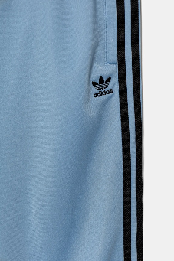 Дитячі спортивні штани adidas Originals блакитний JV8568