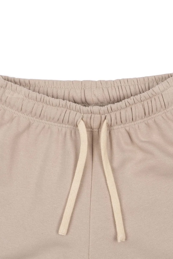 CHLAPEC Dětské kalhoty Konges Sløjd LOU SWEAT PANTS OCS KS103867.9BYA béžová