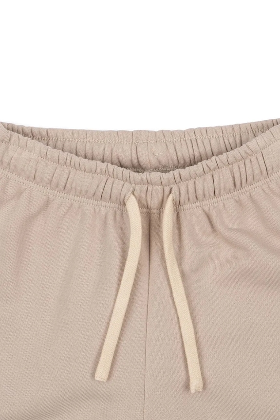 CHLAPEC Dětské kalhoty Konges Sløjd LOU SWEAT PANTS OCS KS103867.9BYA béžová