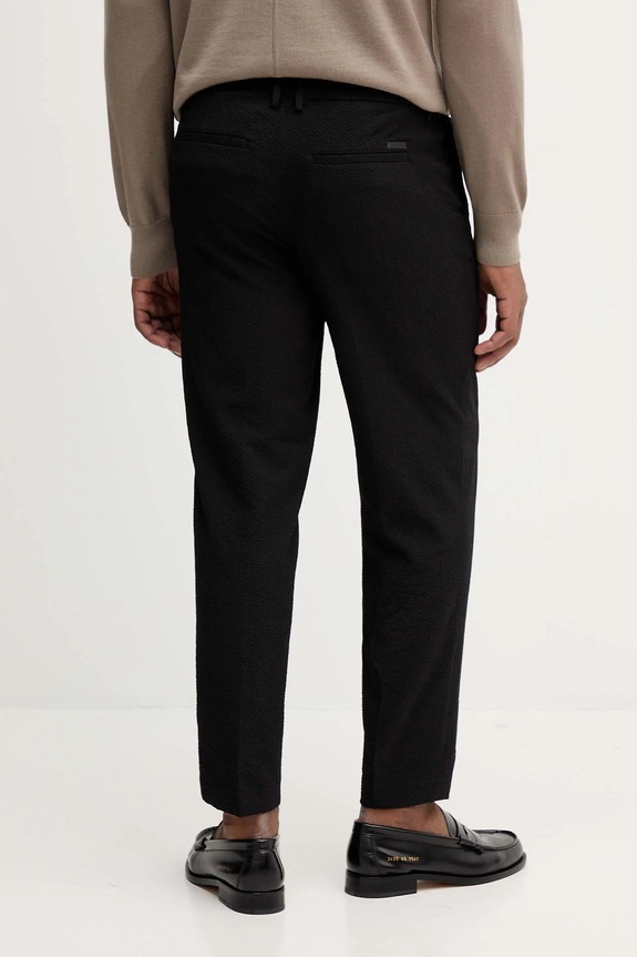 Oblačila Hlače Calvin Klein LV04LC427G črna