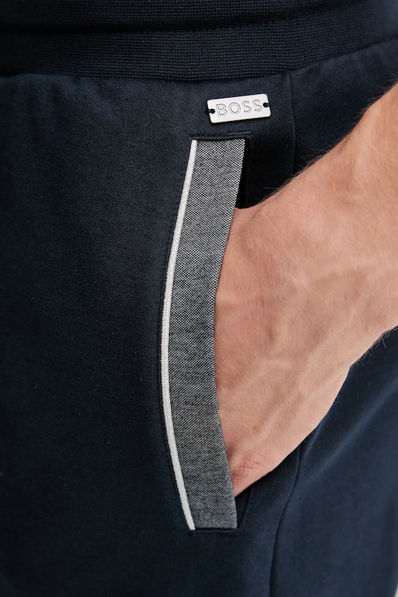 Tepláky BOSS Tracksuit Pants tmavomodrá 50545579