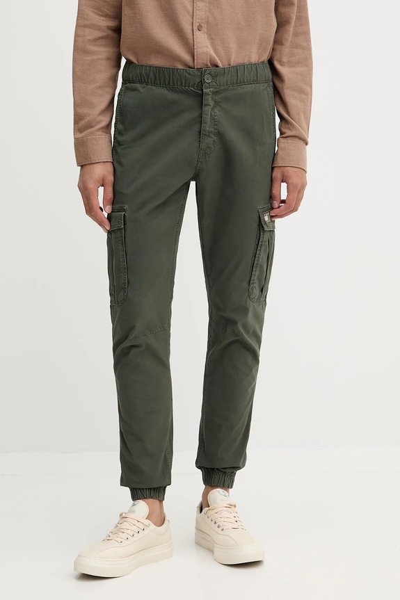 Tommy Jeans spodnie z elastanem zielony DM0DM22003