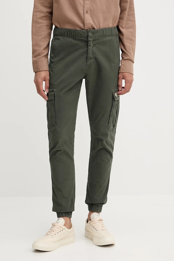 Tommy Jeans spodnie z elastanem zielony DM0DM22003
