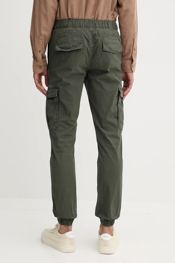 Odzież Tommy Jeans spodnie DM0DM22003 zielony