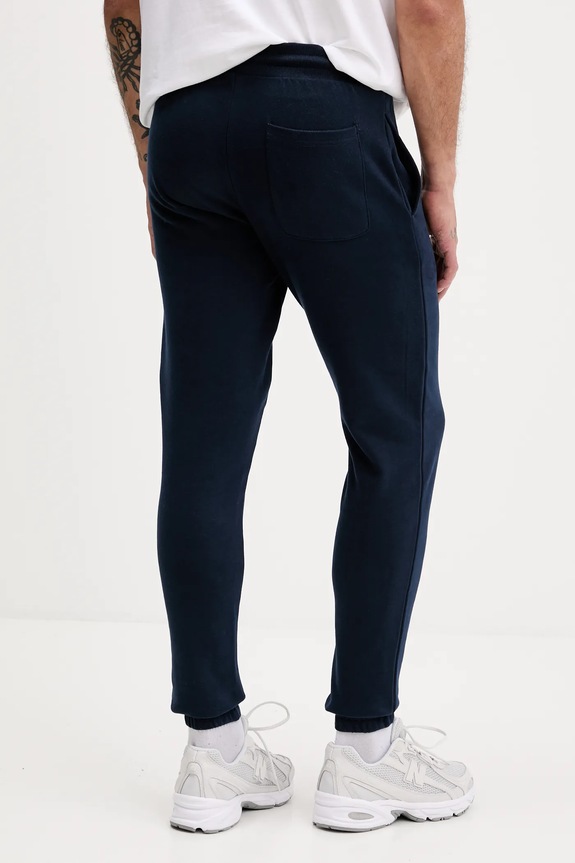 Îmbrăcăminte Tommy Jeans pantaloni de trening din bumbac DM0DM22094 bleumarin