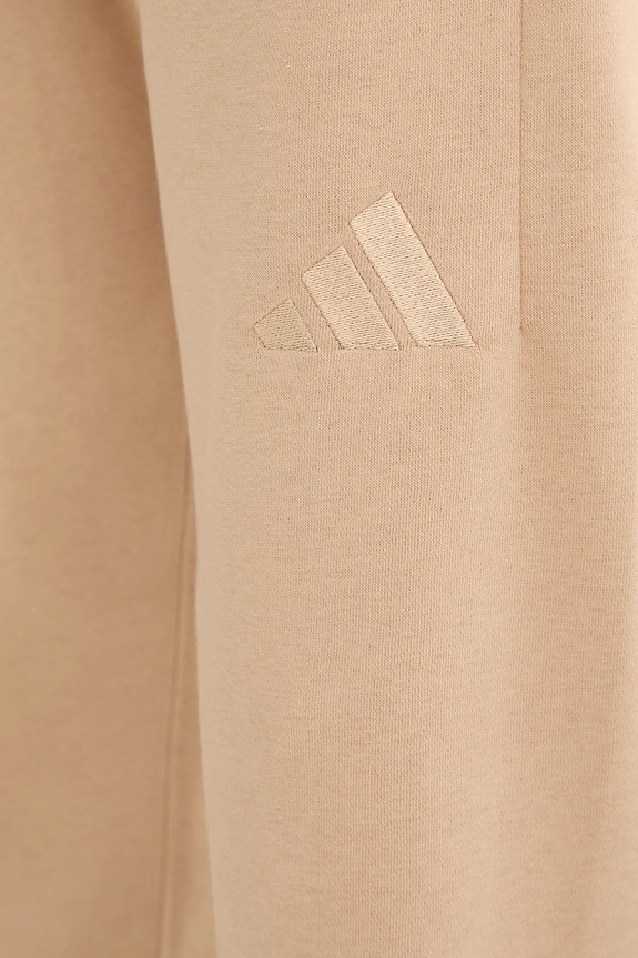 Tepláky adidas All SZN béžová JX5099