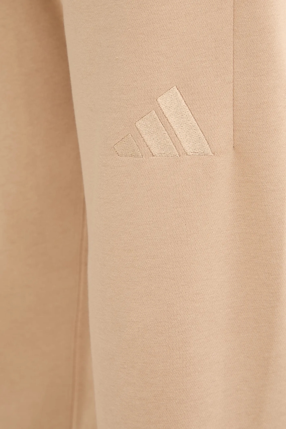 Tepláky adidas All SZN béžová JX5099