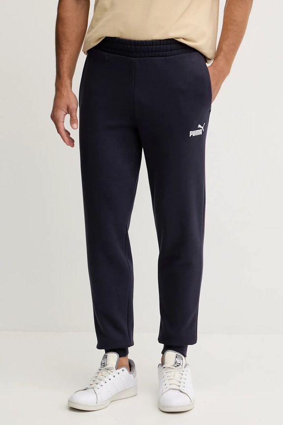 Tepláky Puma Essential Sweatpants pletenina tmavomodrá 682606