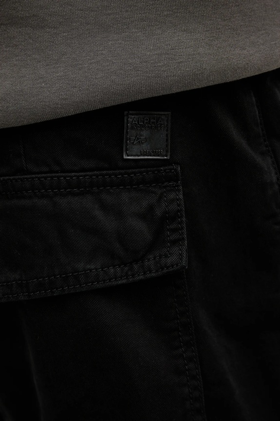 Bavlněné kalhoty Alpha Industries černá 148207.03