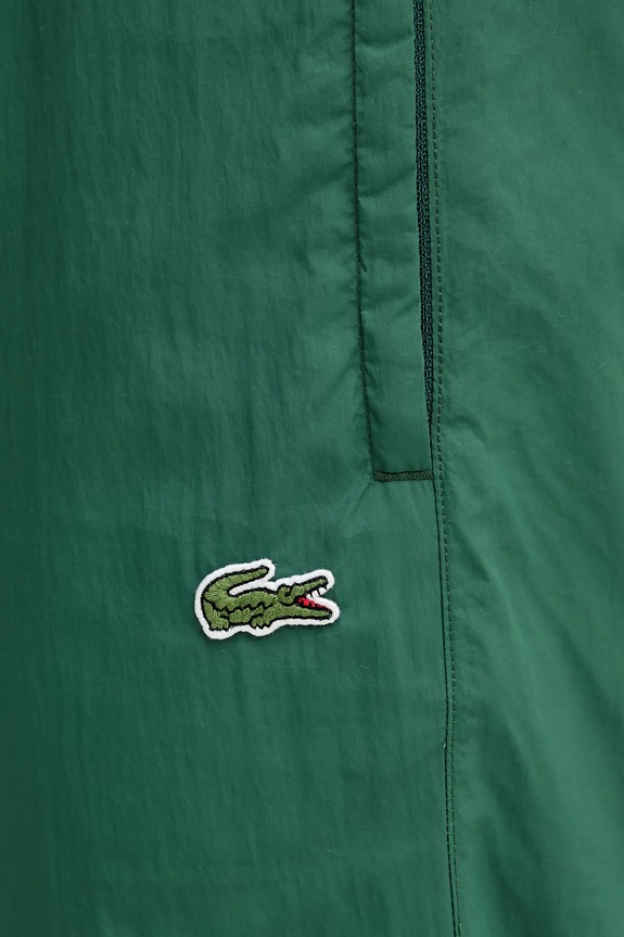 Tepláky Lacoste zelená XH8909