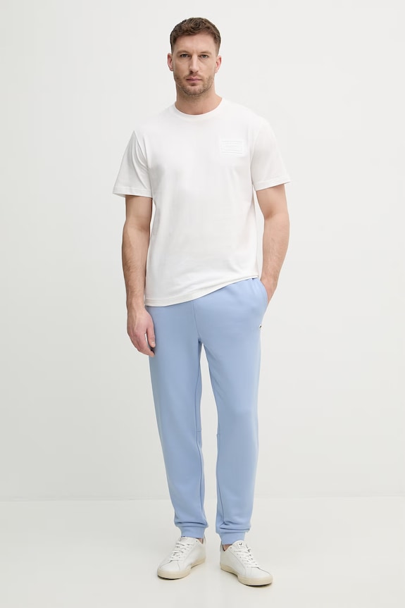 Lacoste spodnie dresowe męskie bawełniane XH9833 niebieski SS26