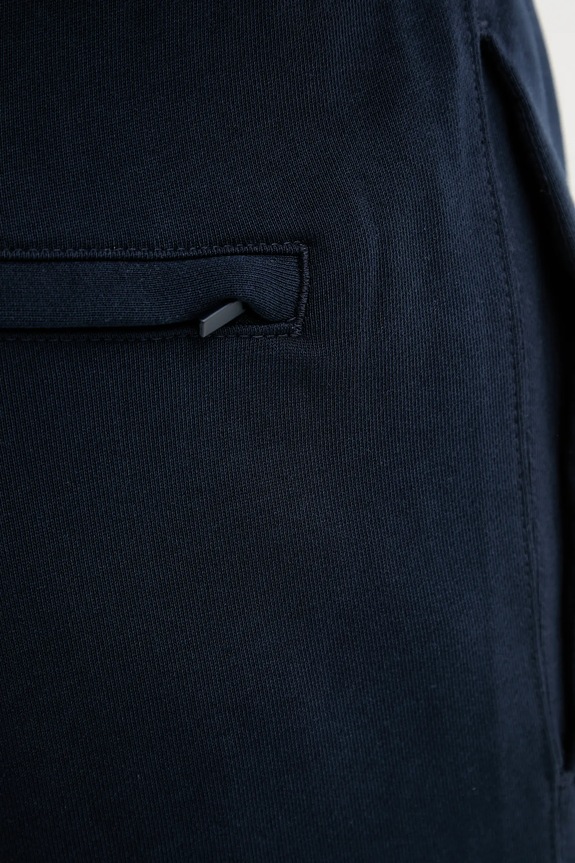 Βαμβακερό παντελόνι Calvin Klein Jeans LV04RD241G σκούρο μπλε