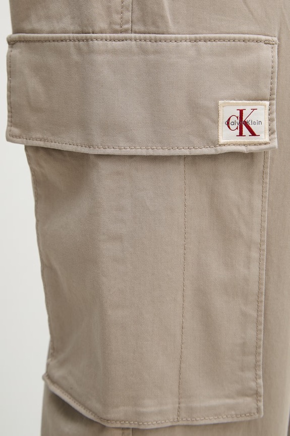 Calvin Klein Jeans nohavice cargo pánske bavlnené s elastanom béžová LV04RD608G