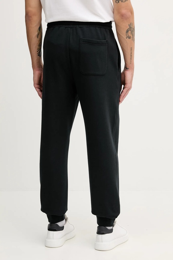 Abbigliamento Converse pantaloni tuta CVM5B978 nero