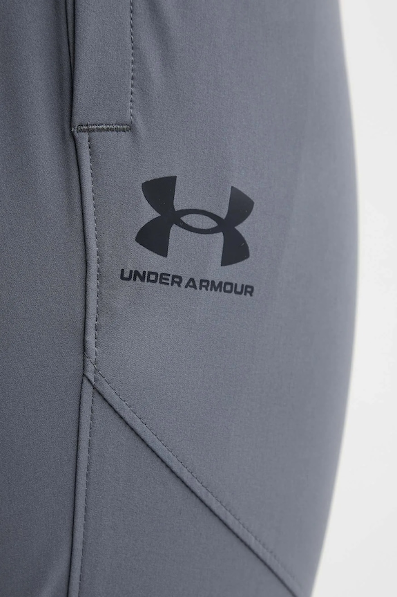 Παντελόνι φόρμας Under Armour Vibe Woven γκρί 1386557