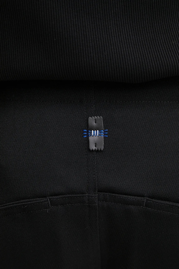 Kalhoty s příměsí vlny Ader Error TROUSERS černá BO01FWBT0101BK