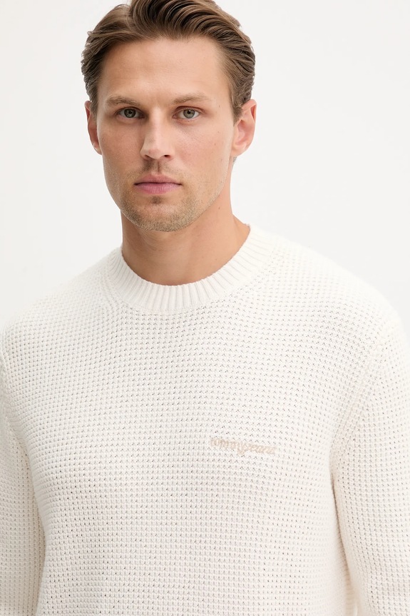 Βαμβακερό πουλόβερ Tommy Jeans μπεζ DM0DM22098