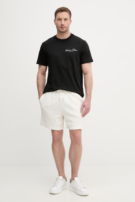 Calvin Klein Jeans teplákové šortky pánske bavlnené LV04RC248G béžová SS26