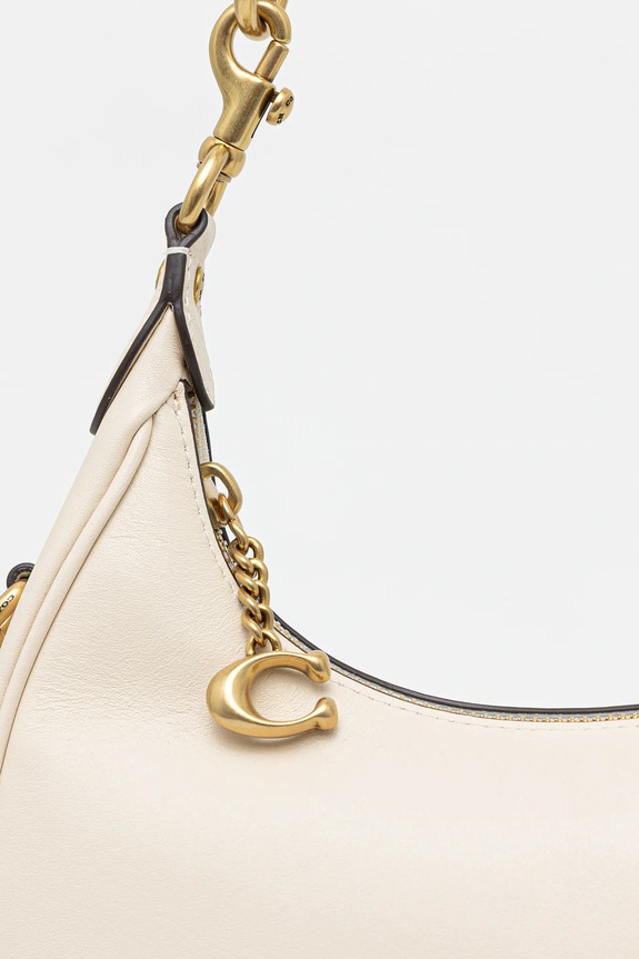 Δερμάτινη τσάντα Coach Jonie 22 μπεζ CBG16