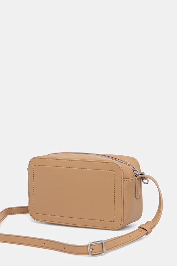 Doplňky Calvin Klein crossbody kabelka dámská z imitace kůže LV04F3220G béžová