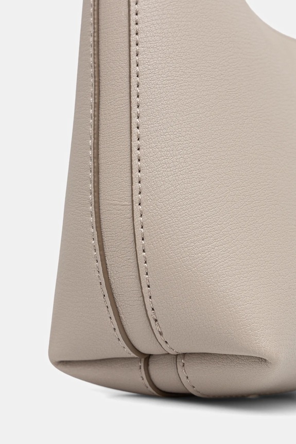 Calvin Klein Geantă de femei cu imitație de piele bej LV04F3272G