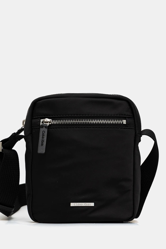 Calvin Klein saszetka nie mieści A4 czarny LV04D3176G
