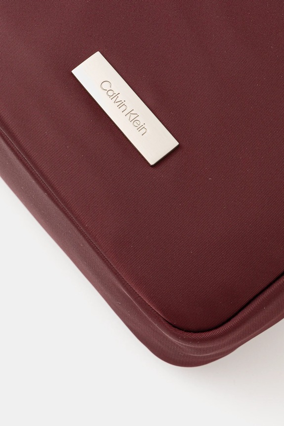 Calvin Klein saszetka bordowy LV04D3180G