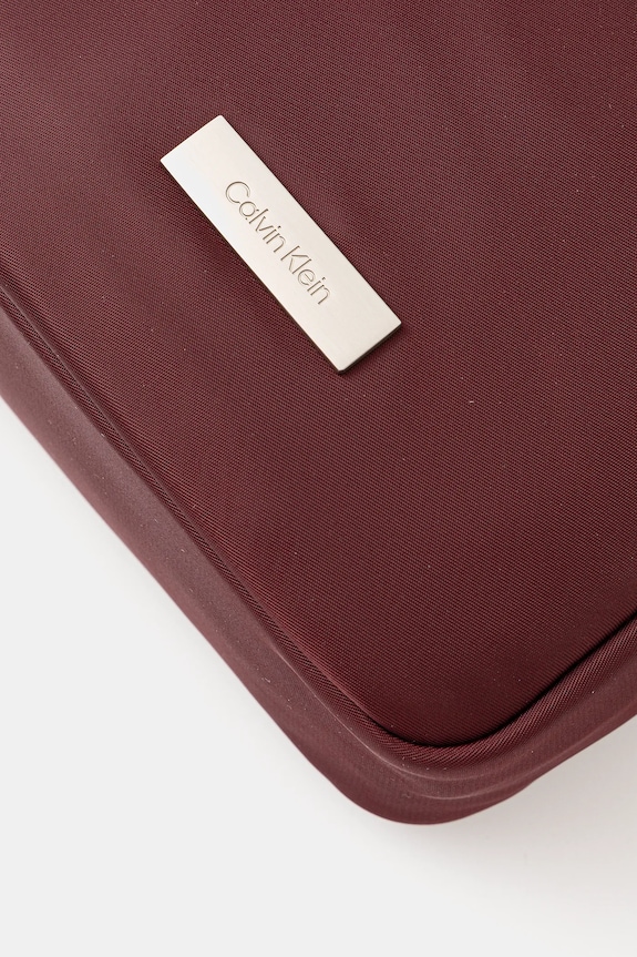 Calvin Klein saszetka bordowy LV04D3180G