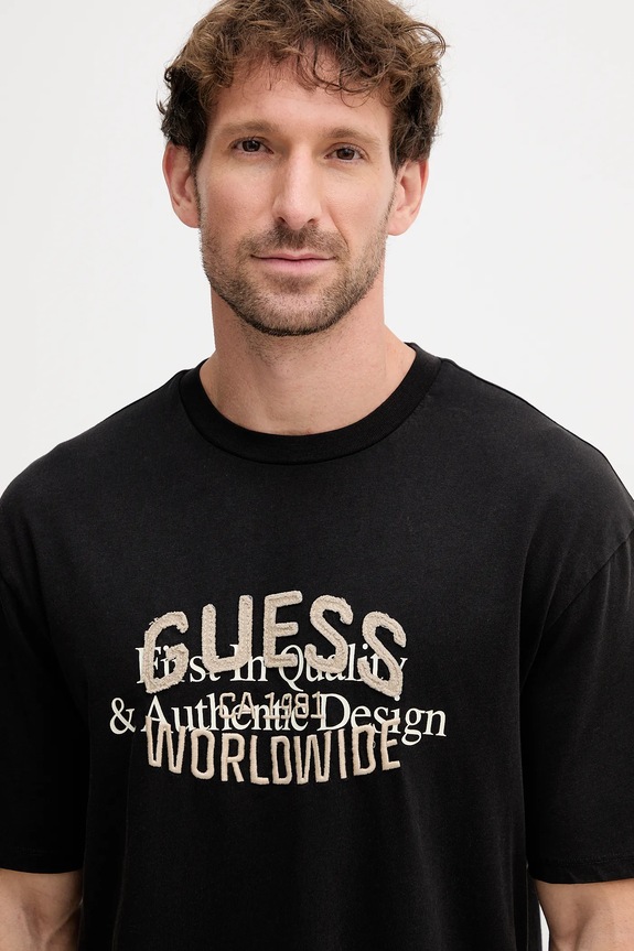 Bavlněné tričko Guess WORLDWIDE černá M5YI49.KBW41