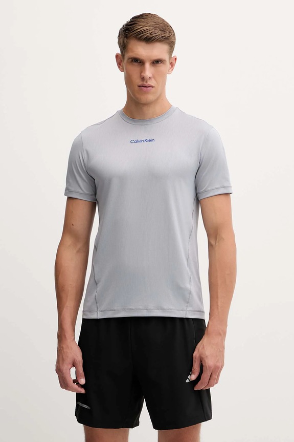 Tréninkové tričko Calvin Klein Performance hladký šedá LVGMF5K101