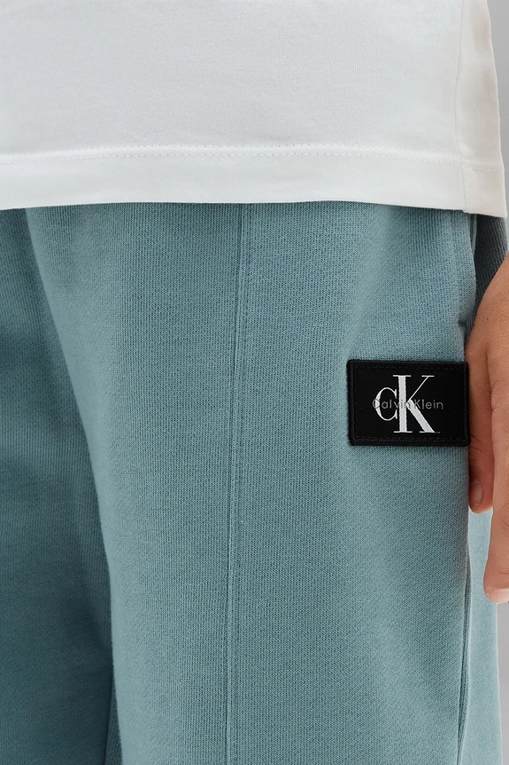 Calvin Klein Jeans teplákové nohavice detské bavlnené LVCKTJC42B.128.176.9BY2 modrá