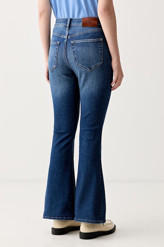 Odzież Calvin Klein Jeans jeansy flare damskie LV047G917G niebieski