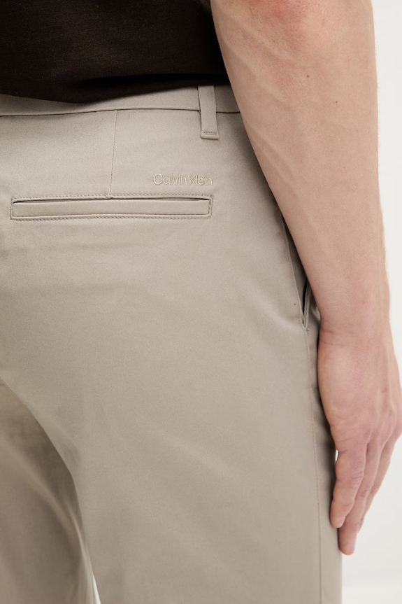 Calvin Klein spodnie slim fit męskie bawełniane z elastanem beżowy LV140EM633