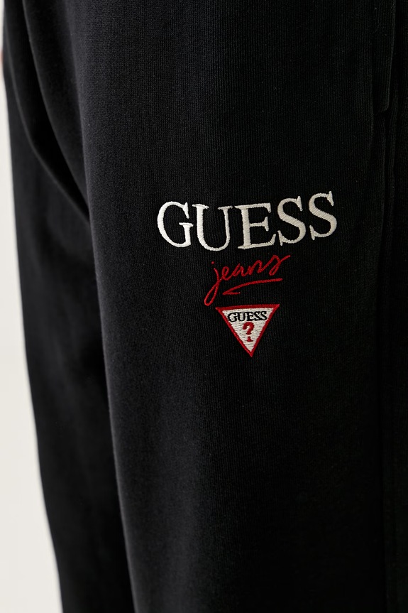 Guess Jeans donji dio trenirke za muškarce od pamuka crna M6YB15.K4842