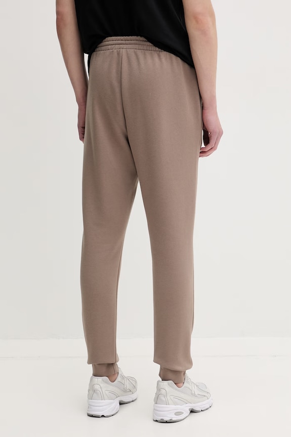 Odzież adidas spodnie dresowe męskie z bawełną Essentials Feelcozy KF2380 brązowy