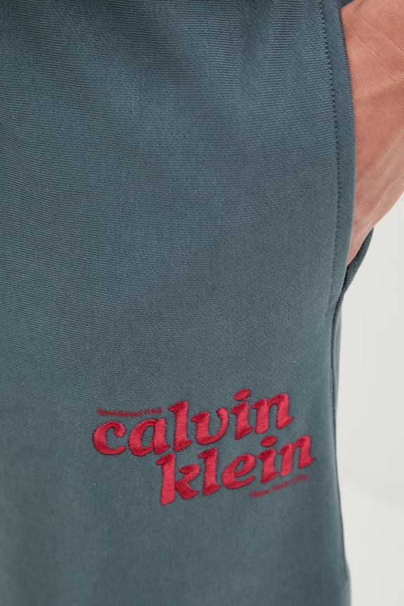 Calvin Klein Jeans tepláky pánské s bavlnou tyrkysová LV04LG216G