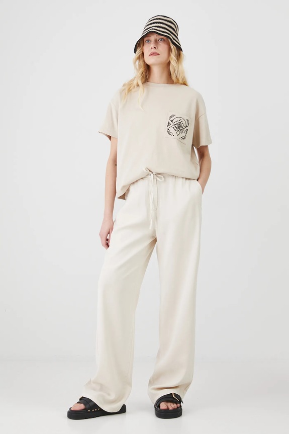 Spodnie damskie gładkie z lyocellu kolor beżowy tkanina beżowy RS25.SPD604