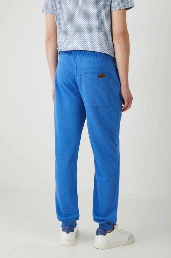 Odzież Spodnie dresowe męskie jogger melanżowe kolor niebieski RS25-SPM080 niebieski