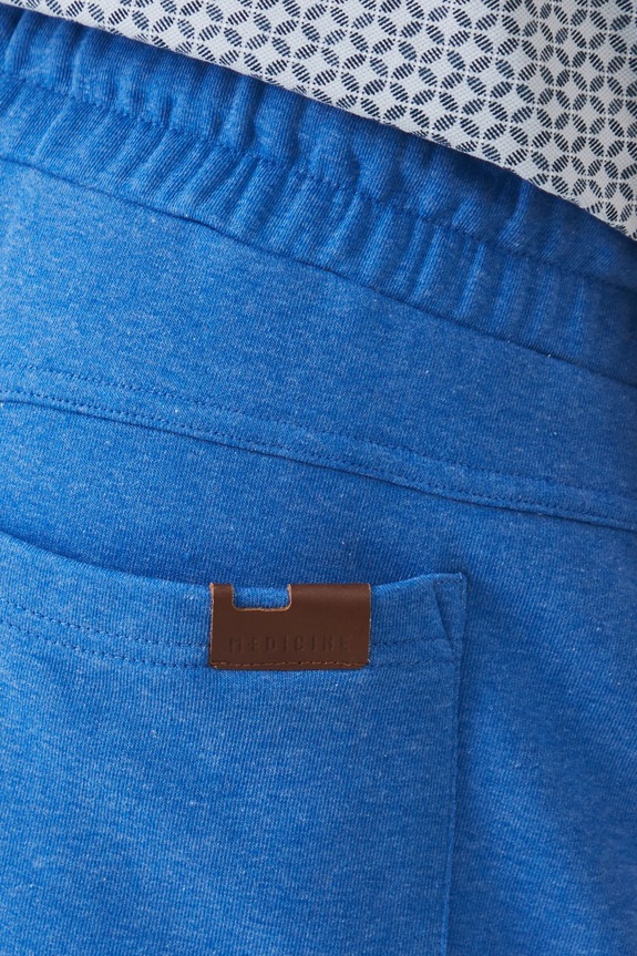 Spodnie dresowe męskie jogger melanżowe kolor niebieski niebieski RS25-SPM080