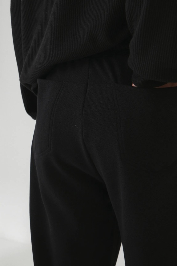 Spodnie dresowe męskie regular z dzianiny strukturalnej kolor czarny czarny RS25.SPM201