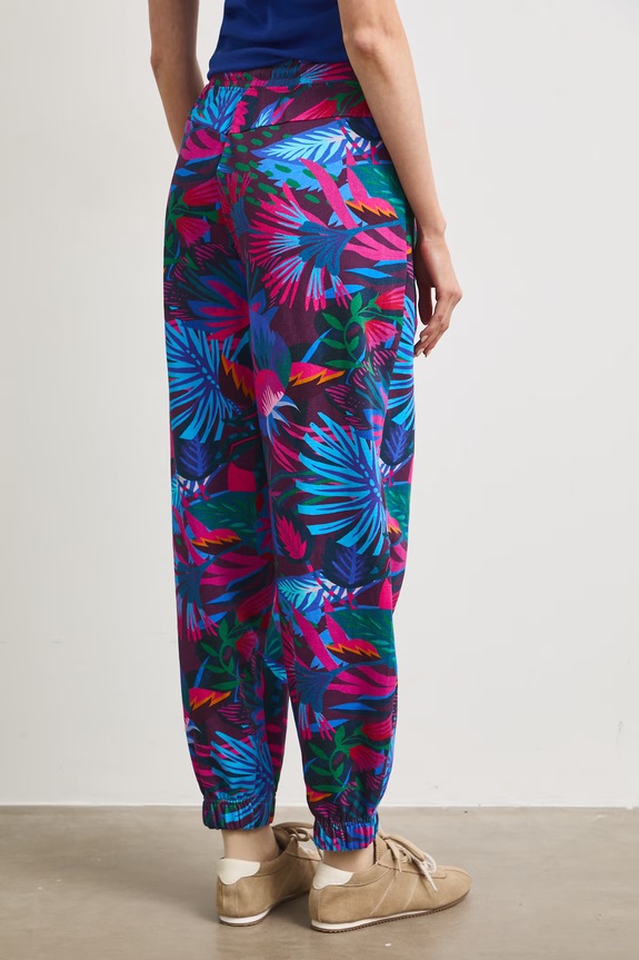 Odzież Spodnie dresowe damskie z motywem roślinnym RS26-SPD092 multicolor